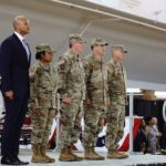 Governor Wes Moore with 4 National Guard Soldiers