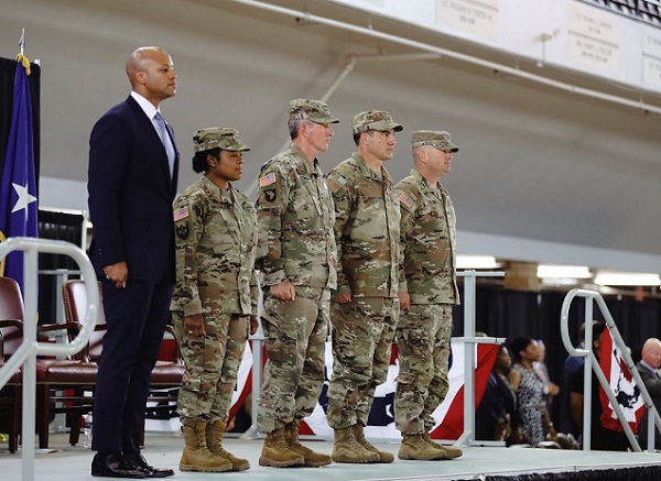 Governor Wes Moore with 4 National Guard Soldiers